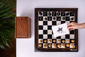 Schachspiel Transmission <br>aus Ebenholz und Buchsbaum